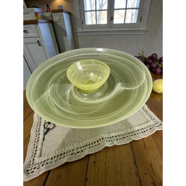 The Round Chartreuse White Opaque Swirl Art Glass Chip & Dip Platter is a beautifully crafted piece of decorative...