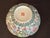 A stunning early 20th-century Chinese Famille Rose porcelain bowl, delicately hand-painted with vibrant floral sprays,...