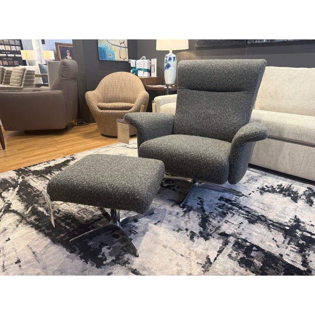 Elevate your living space with this sophisticated and sumptuously comfortable matching armchair and ottoman set. Combining...