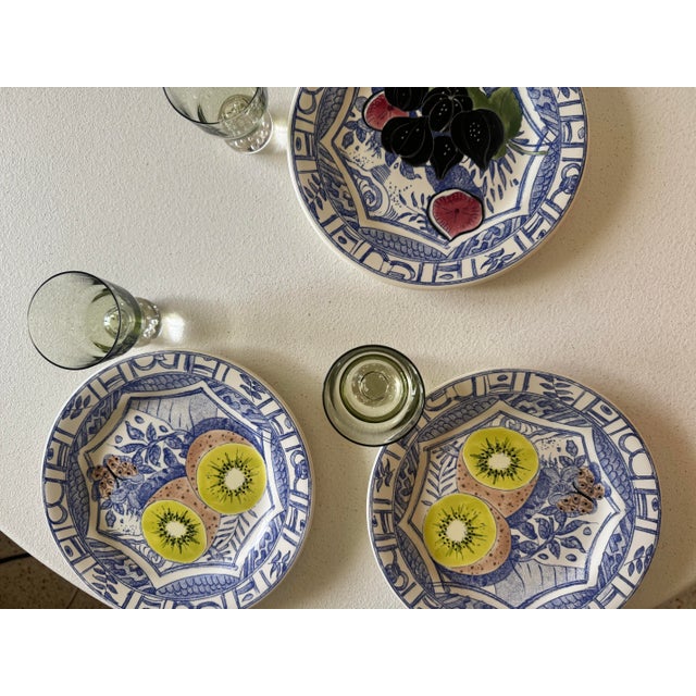 --- **DESCRIPTION** A charming French faience dinner plate from Gien's iconic Oiseau Bleu (Blue Bird) collection,...