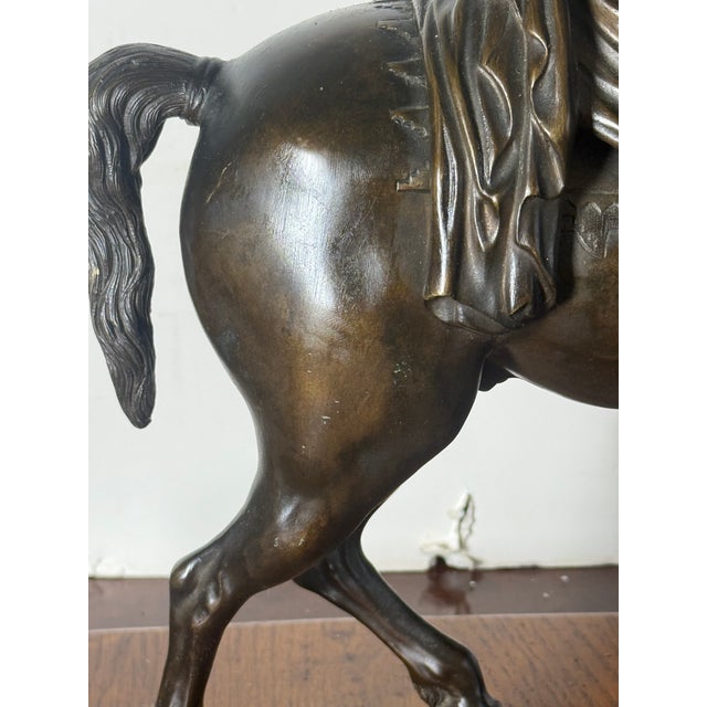 This bronze sculpture of Roman Emperor Marcus Aurelius is from Ancient Rome and was made after the Antique Equestrian...