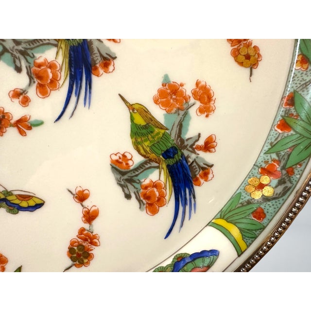 The La Porcelain Limousine. French serving platter with silver rim. We could not find a mark on the silver other than what...