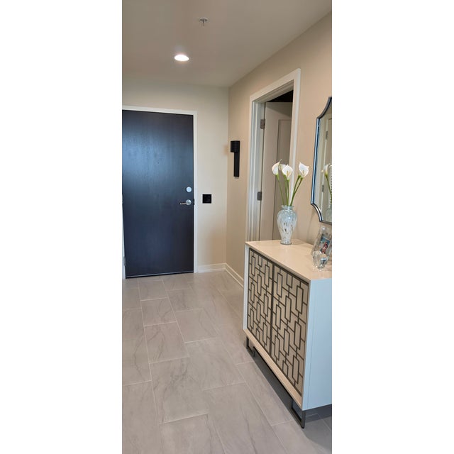 This beautiful modern wall sconce brings a sleek look to your entryway or little spot needing some additional light. Made...