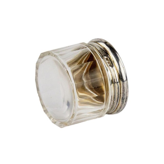 Ladies cream box made of glass with a silver lid: sky blue, guilloché enamel. England 20th century. London. 925 sterling...