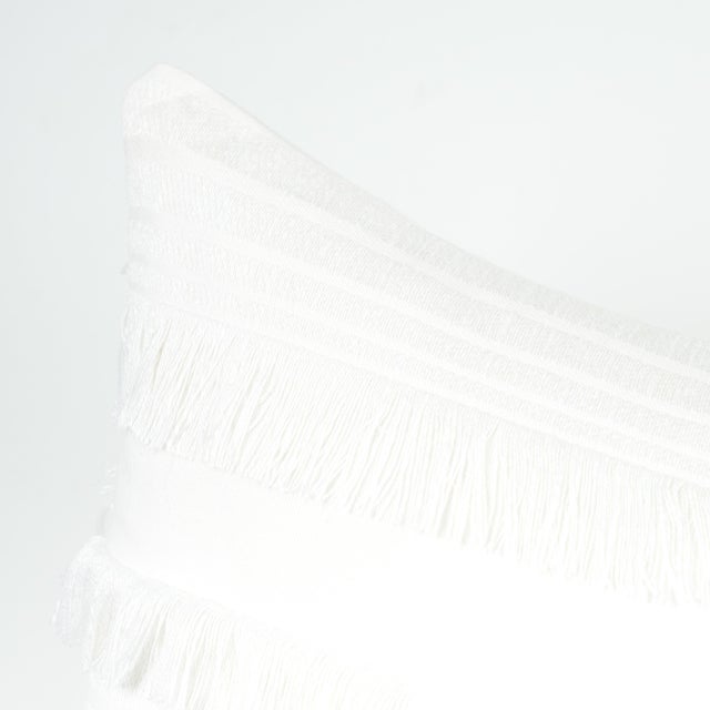 This pillow features Talos with a knife edge finish. Inspired by a textile in the Schumacher archive from the 1970s, Talos...