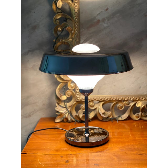 Ro table lamp by artemide, designer bbpr (banfi, belgiojoso, peressutti, and rogers), designed and manufactured in italy....