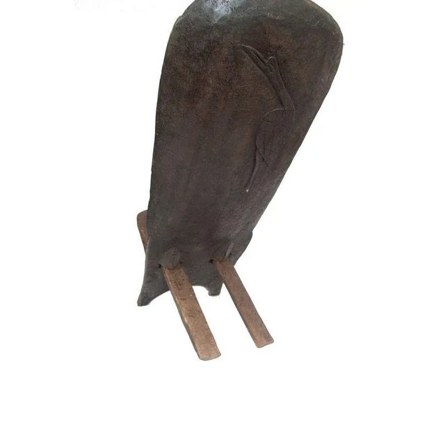 One of a kind vintage wood chair. Comes apart in two pieces. Bird carving detail on the back of the chair.