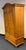 Beautifully crafted Ethan Allen farmhouse-style armoire featuring solid pine construction with a warm, honey-amber finish...