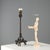 Bronze lamp in the style of Christophe Fratin (1801-1864). The base features three lion figures with tails twisted around...