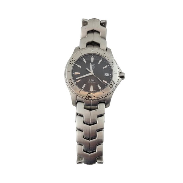 Tag Heuer Link Watch Model: WJ1110-0 Serial: FE2699 Stainless steel case and band Case is 39mm in diameter Watch band is...