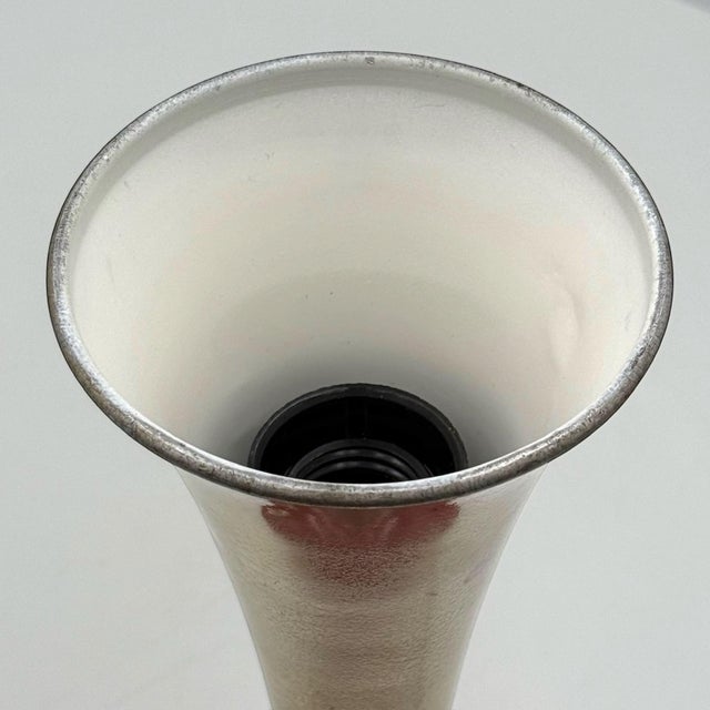 An exquisite piece of mid-century Italian design, this vintage table lamp from the 1950s/1960s brings elegance and...