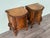 Pair of walnut bedside tables with finely crafted curved legs, embellished with elegant carvings and various details. The...
