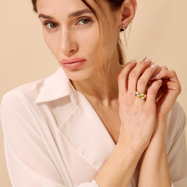 Created in 18 karat yellow gold Peridot 1.7 carats approx. Blue topaz 1.7 carats approx. Diamond 0.4 carat approx. Ring...