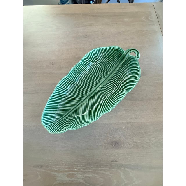 Large banana leaf bowl by Bordallo Pinheiro of Portugal. It’s in a rich green and really makes a statement!