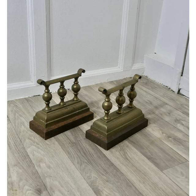 A Heavy and Attractive Pair of Victorian Brass Andirons or Fire Dogs This very attractive pair of brass Andirons are 7”...