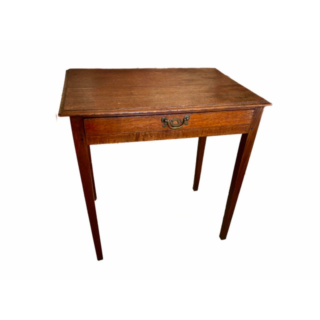 Late 18th c. to early 19th c. side table. Dowel costruction, Marlborough legs. Single drawer at front. Small separation on...