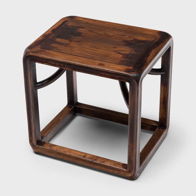 The streamlined form of this low Chinese side table draws from the austere designs of Ming-dynasty furniture. Lightweight...