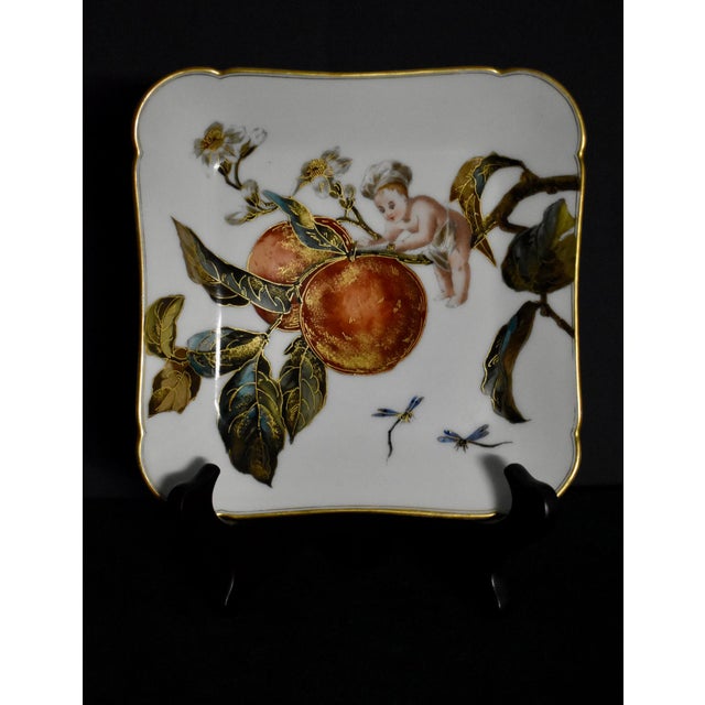 Antique: Late 19th Century Square Plate by Limoges. Made of Porcelain. The origin is France. Cherub & Fruit Details and a...