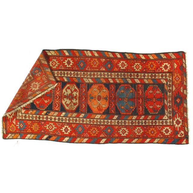 This is an original Russian Kazak rug. Handmade and hand-knotted. Lamb's Wool on a Wool Foundation Hand-Spun Wool Rug...