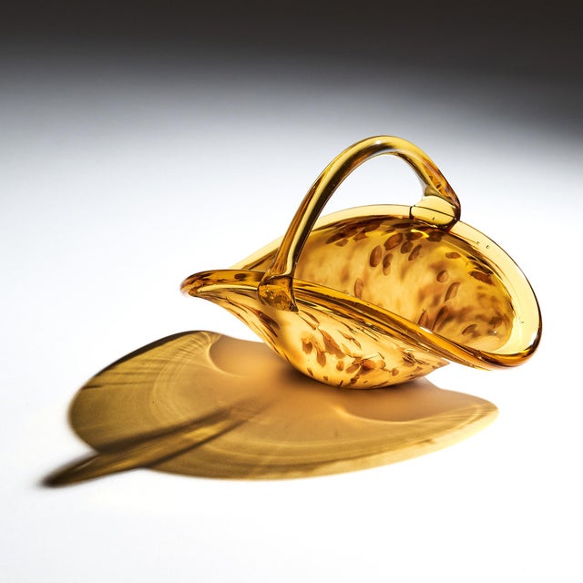 Murano glass basket/ Bowl from the island of Murano. Featuring Amber and ivory colors combined together in the...