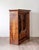 A handsome 19th-century Italian walnut bookcase or display cabinet, distinguished by its strong architectural proportions...