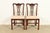 An outstanding pair of Georgian or Chippendale style side chairs or dining chairs In the manner of Baker Furniture USA,...