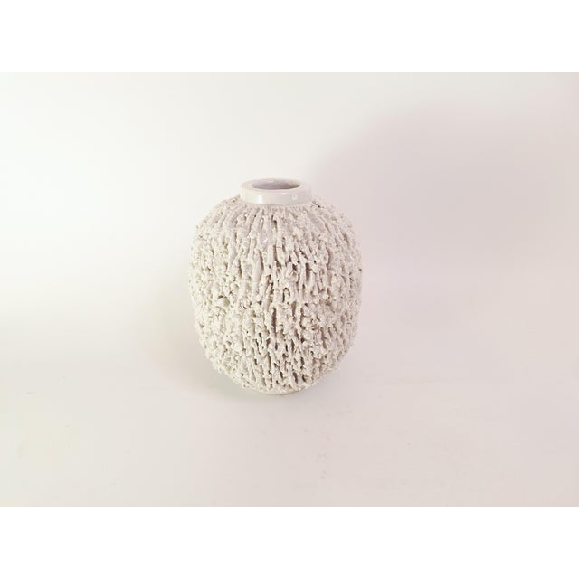 Sculptural “Hedgehog” vase designed by Gunnar Nylund for Rörstrand, Sweden. This is the AI model with white glaze,...