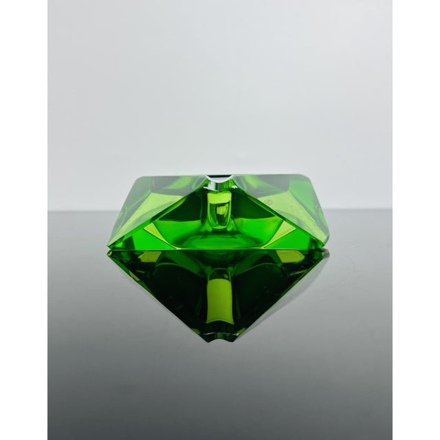 Produced by Moser in Karlovy Vary (Karlsbad), Czechoslovakia, circa 1930. Crafted from vivid green uranium glass and...
