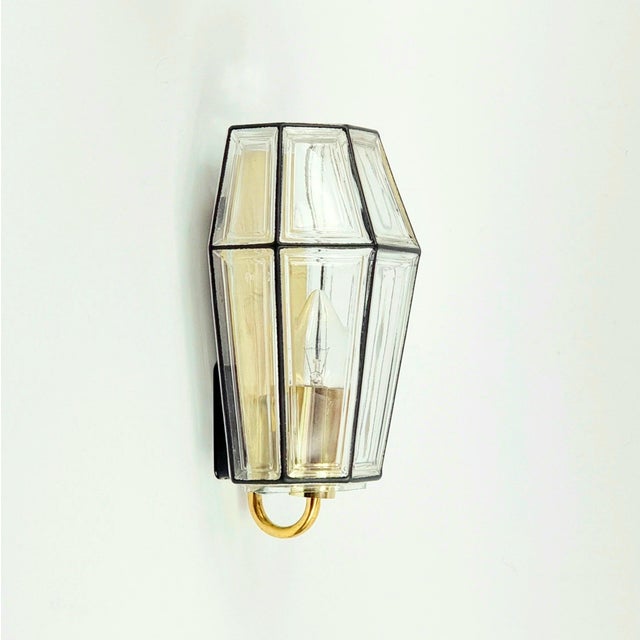 Stunning pair of mid-century modern wall lights/sconces from Limburg, Germany's leading glasswork, renowned for its...