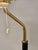 Artek A808 lamp, brass shade with white bottom grille, and brass base with black leather. Manufacturer Valaistustyö,...