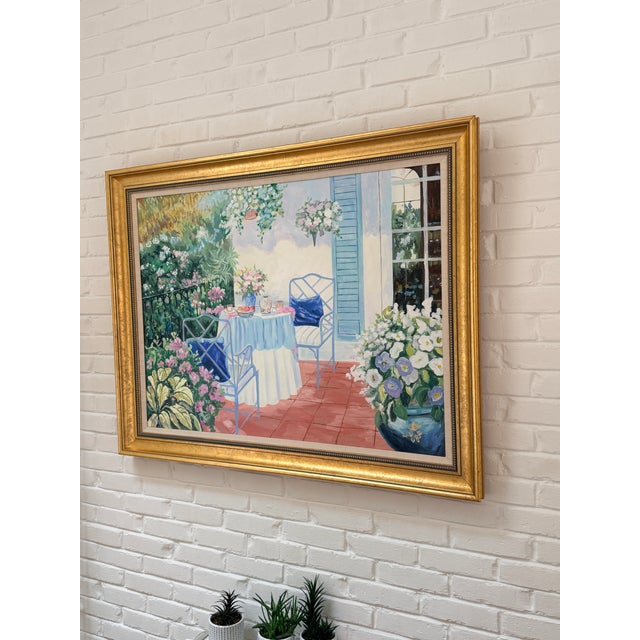 A vibrant and joyful large oil painting signed in the bottom left corner. Small linen mat inside a wide gilt frame....