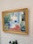 A vibrant and joyful large oil painting signed in the bottom left corner. Small linen mat inside a wide gilt frame....