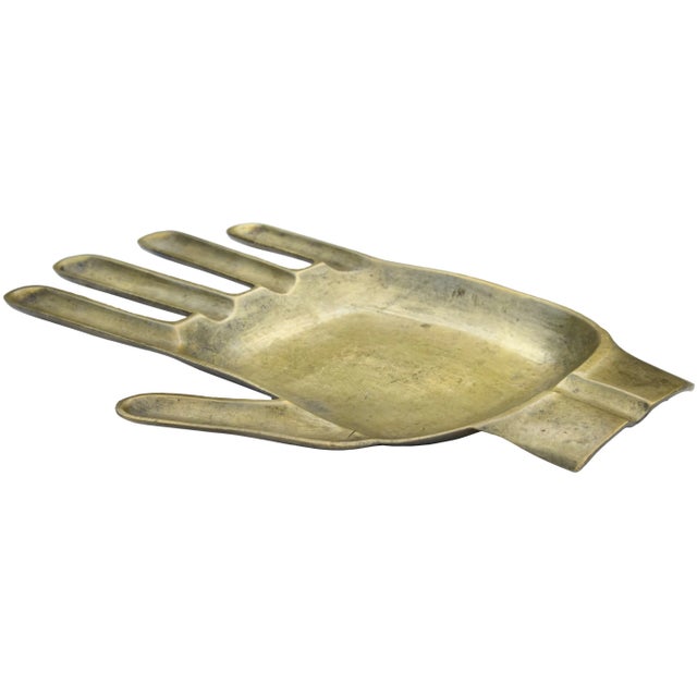 We can't get enough of this antique brass ashtray/catchall and how it brings a touch of playful artisanship to any space....