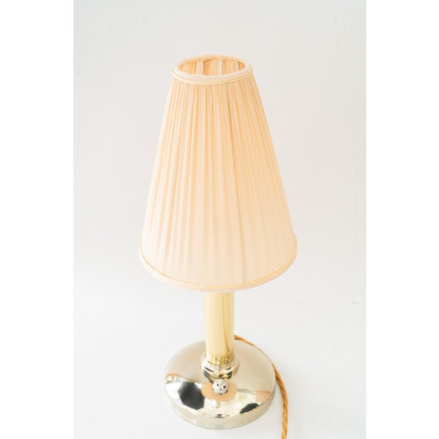 Alpaca ( white metal ) The fabric shade is replaced ( new ) Polished and stove enameled European Plug (up to 250V).The...