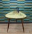 A real eye-catcher! beautiful side table/coffee table cocktail table on tapered legs with metallic-colored ends...