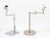 Two Contemporary Silver-Tone Metal and Chrome Desk Lamps, one with L-form base, other with articulating arm on circular...