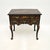 A charming and very well made antique lacquered Chinoiserie lowboy side table in the Georgian style. This was made in...
