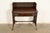 A gorgeous Mission or Arts & Crafts wicker writing desk By Heywood-Wakefield USA, Circa 1890s Oak and woven rattan with...