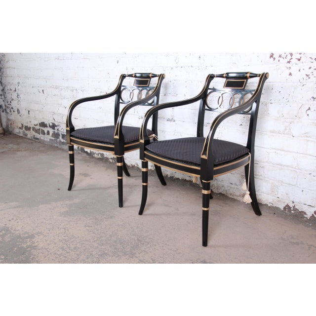 Baker Furniture Ebonized and Gold Gilt Regency Style Armchairs, Pair