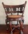 Pair of 19th Century Teakwood Burgomaster Chairs with Caned Swivel Seats A striking pair of 19th-century teakwood Dutch...