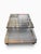 Large square coffee table with an architectural design, typical of modernist furniture from the 1970s and 80s. The...