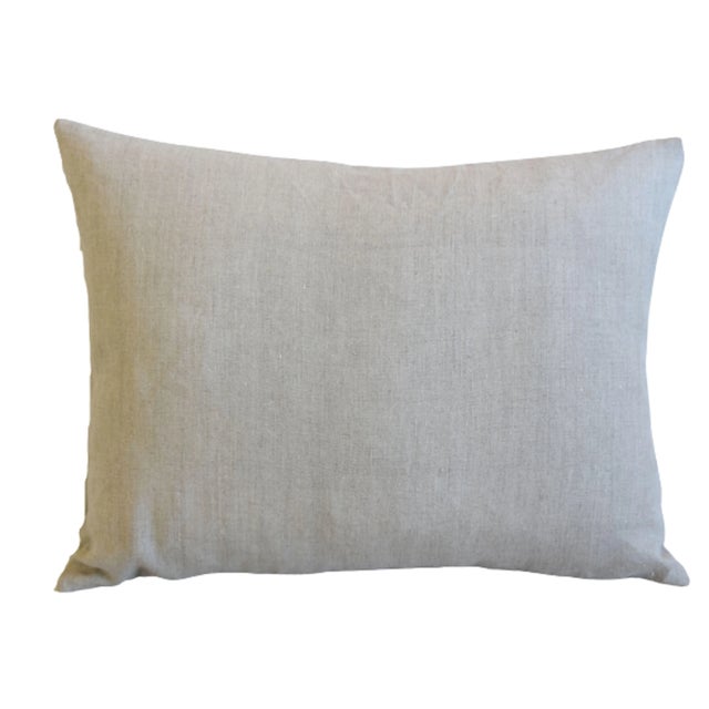 Custom-tailored pillow in Belgian linen fabric. Same fabric on reverse. Zipper closure. New goose down-and-feather insert....