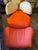 Wink recliner armchair by cassina, designed by toshiyuki kita, 1980. It stands out for its vibrant coral-colored...