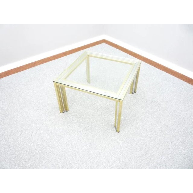 Nice coffee table from Italy. Very good original condition with slight signs of wear. Glass plate is undamaged and looks...