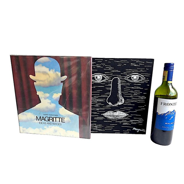 Offered is a lovely art monograph book, "Magritte: Ideas and Images", by Harry Torczyner, an international lawyer, close...