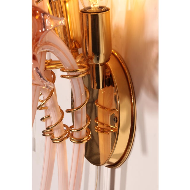 A truly exceptional and highly decorative vintage Murano set wall lamps, dating from the 1970s and attributed to the...