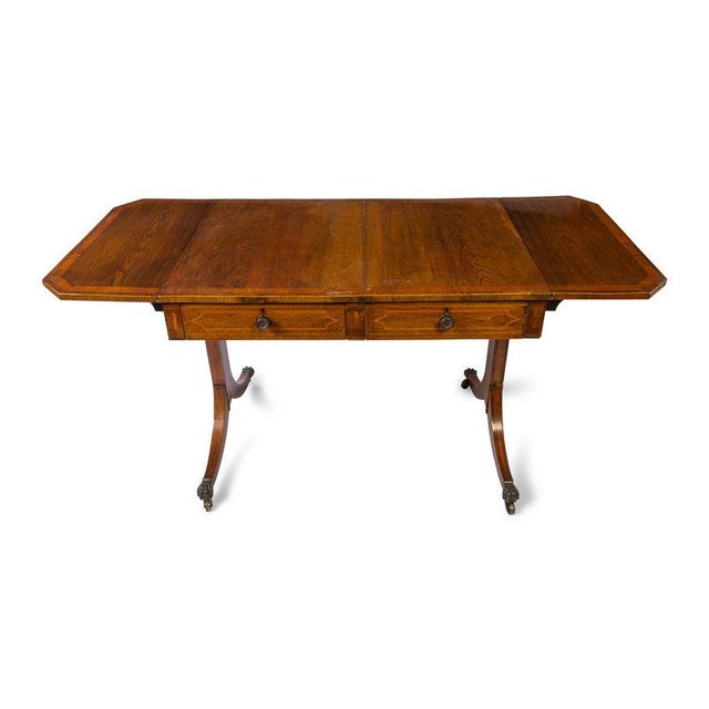 Early to mid 19th c., England, rectangular Regency Pembroke writing table mahogany top over two frieze drawers set with...