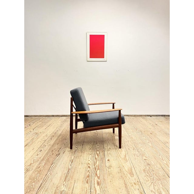 73 x 75 x 77 cm (wxhxt) very elegant armchair by grete jalk in a version in teak. Produced by france and son in denmark....