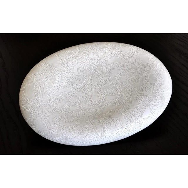 Musical plate from 2011 in porcelain, 4x33,5x24,5 cm inside the plate there are small pearls, which make a pleasant sound...