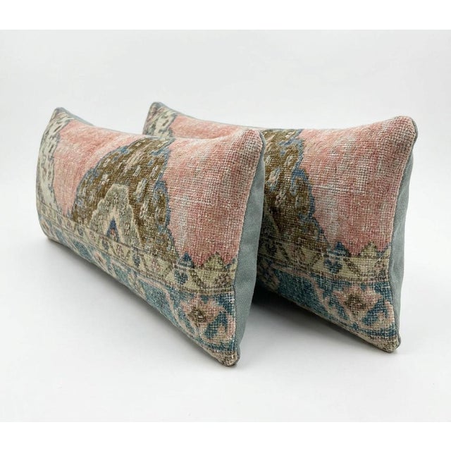 This beautiful 15'' x 47'' & 16'' x 47'' pillow cover set was made from authentic Turkish rug pieces. Bright colors of...